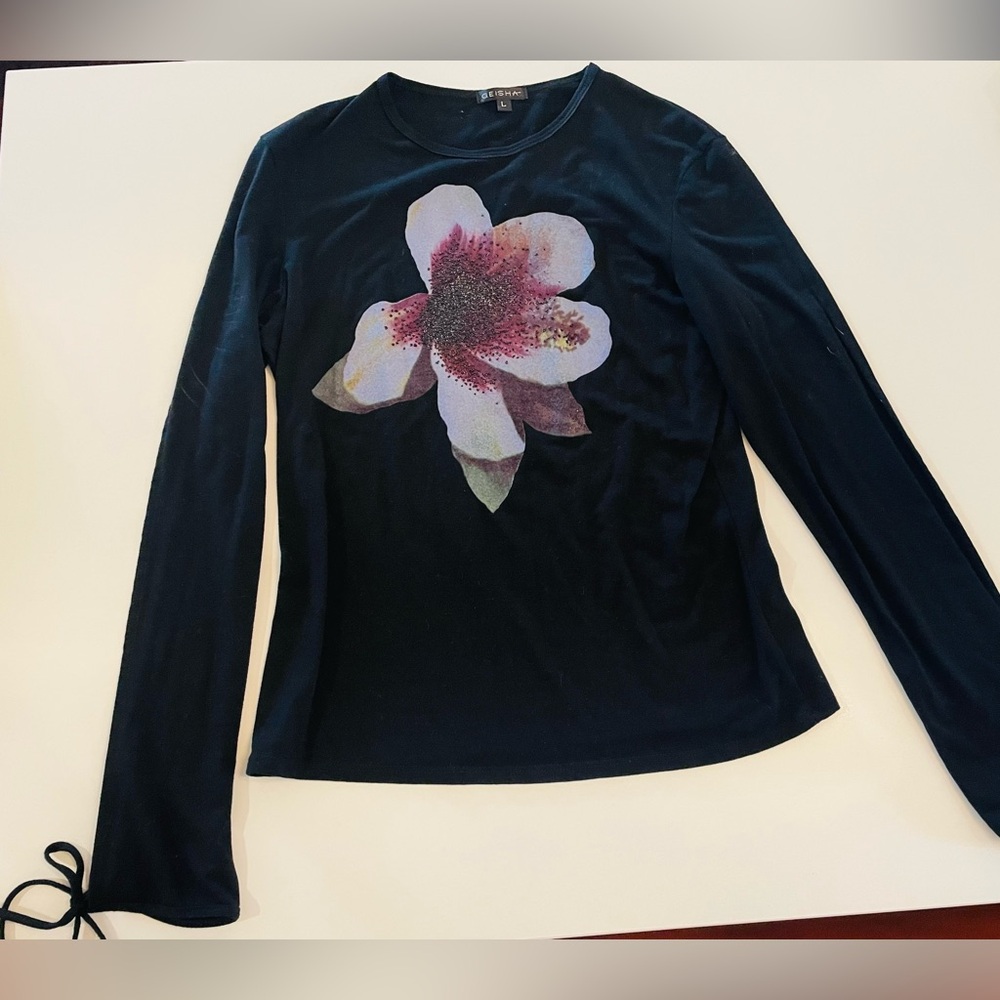 Black Top, sexy cut, sleeves ties at wrist. Size Large beaded w/ orchard design